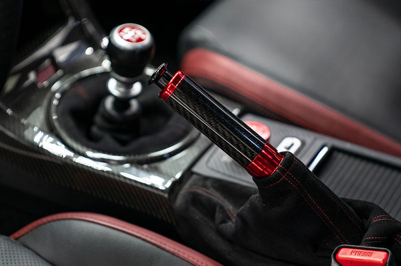 OLM Signature Series Ebrake Handle (Black Carbon w/Red) - 2015-2021 WRX & STI / 2013-2022 FR-S / BRZ / 86 / 2014-2018 Forester / 2013+ *Crosstrek